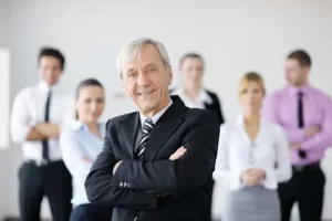 Close-up image of professionals discussing company culture in a collaborative office environment.